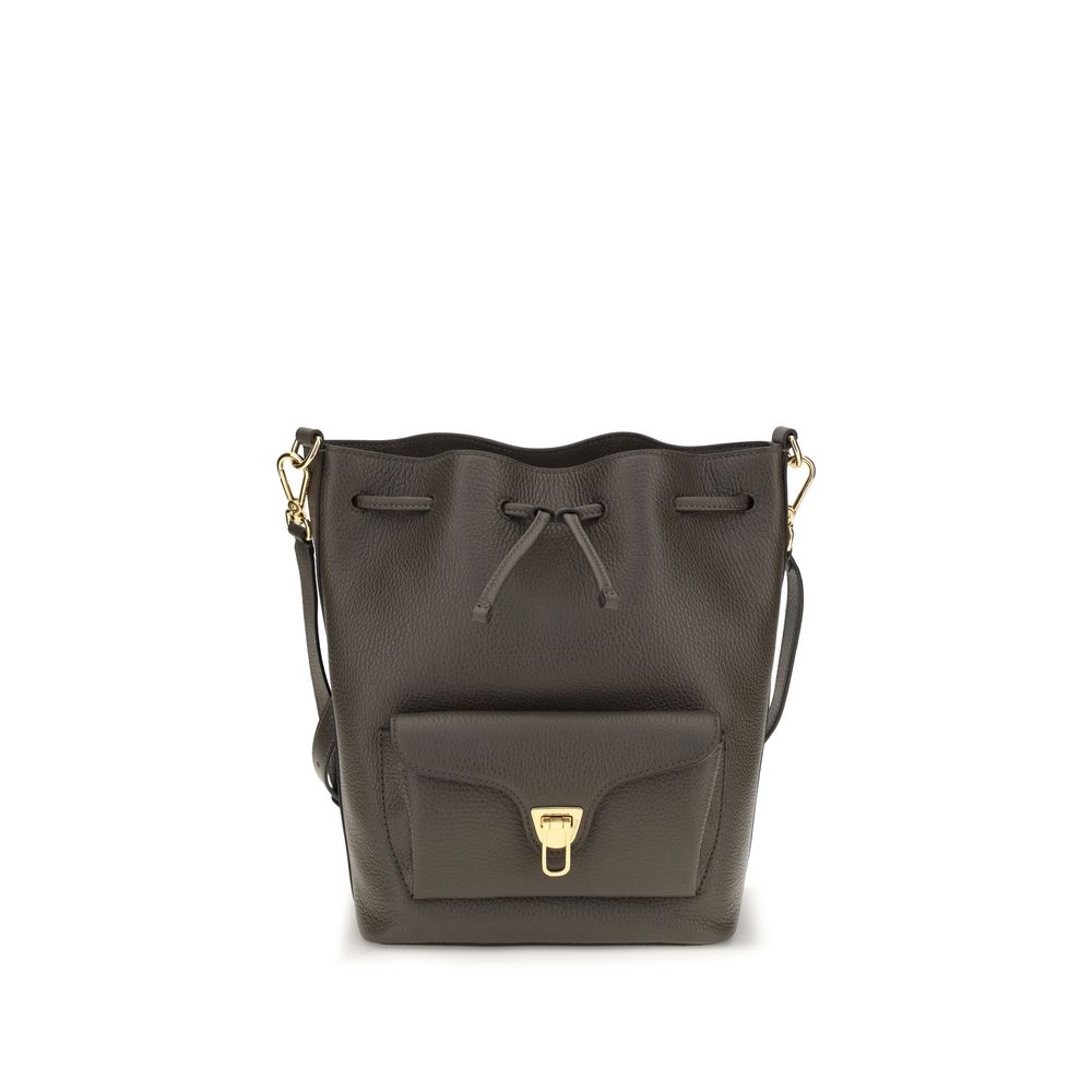 Bucket Handbag by Coccinelle for women in bos taurus calf grained leather brown, gold & signature features an sun-drenched silhouette, showcasing a secure zipper & drawstring, ample external-pockets, and versatile adjustable-strap & handle for a truly sun-drenched finish.