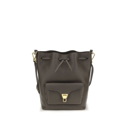 Bucket Handbag by Coccinelle for women in bos taurus calf grained leather brown, gold & signature features an sun-drenched silhouette, showcasing a secure zipper & drawstring, ample external-pockets, and versatile adjustable-strap & handle for a truly sun-drenched finish.