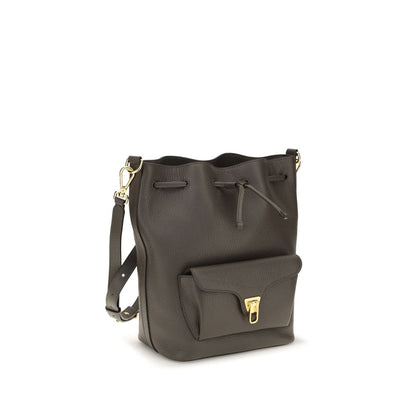 Bucket Handbag by Coccinelle for women in bos taurus calf grained leather brown, gold & signature features a effortlessly chic silhouette, showcasing a secure zipper & drawstring with ample external-pockets and versatile adjustable-strap & handle for a effortlessly chic finish.