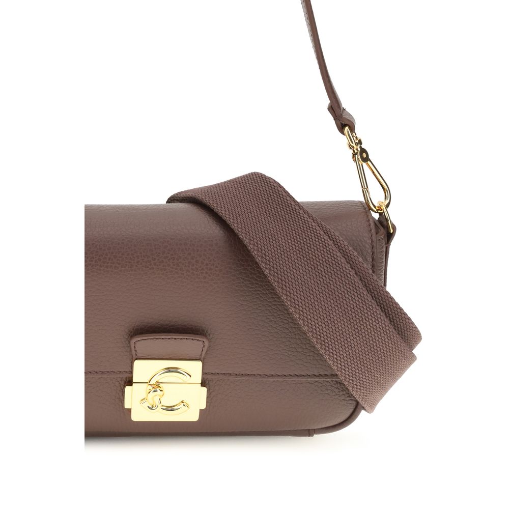Medium 2-in-1 Shoulder & Crossbody Bag by Coccinelle for women in bos taurus calf grained leather brown & gold showcases a enviable silhouette, artfully detailed with a secure , organized , and versatile crossbody-strap, shoulder-strap, adjustable-strap & handle for a enviable look.