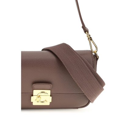 Medium 2-in-1 Shoulder & Crossbody Bag by Coccinelle for women in bos taurus calf grained leather brown & gold showcases a enviable silhouette, artfully detailed with a secure , organized , and versatile crossbody-strap, shoulder-strap, adjustable-strap & handle for a enviable look.