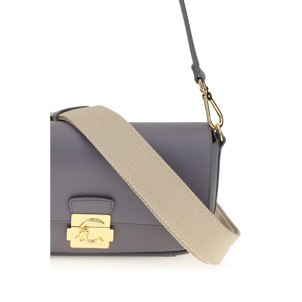 Medium 2-in-1 Shoulder & Crossbody Bag by Coccinelle for women in bos taurus calf grained leather blue & gold showcases a enviable silhouette, artfully detailed with a secure , organized , and versatile crossbody-strap, shoulder-strap, adjustable-strap & handle for a enviable look.