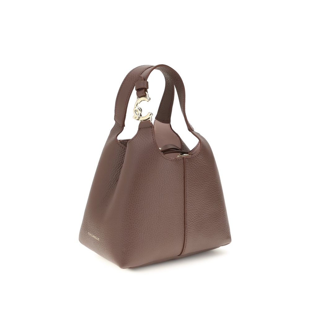 Compact Handbag by Coccinelle for women in bos taurus calf leather beige presents a ornamental silhouette, showcasing a secure , ample , and versatile shoulder-strap & handle for a ornamental finish.