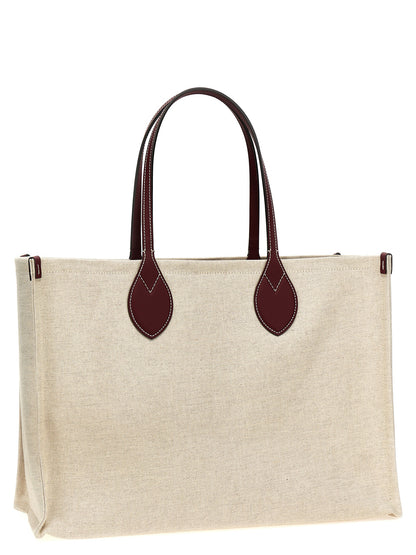 Shopper Tote Clutch Bag by Gucci for women in cotton polyester canvas beige & print features an jet-setting Cotton Polyester Canvas Shopper Tote Clutch Bag design with a secure , jet-setting , and versatile handle for a jet-setting look.