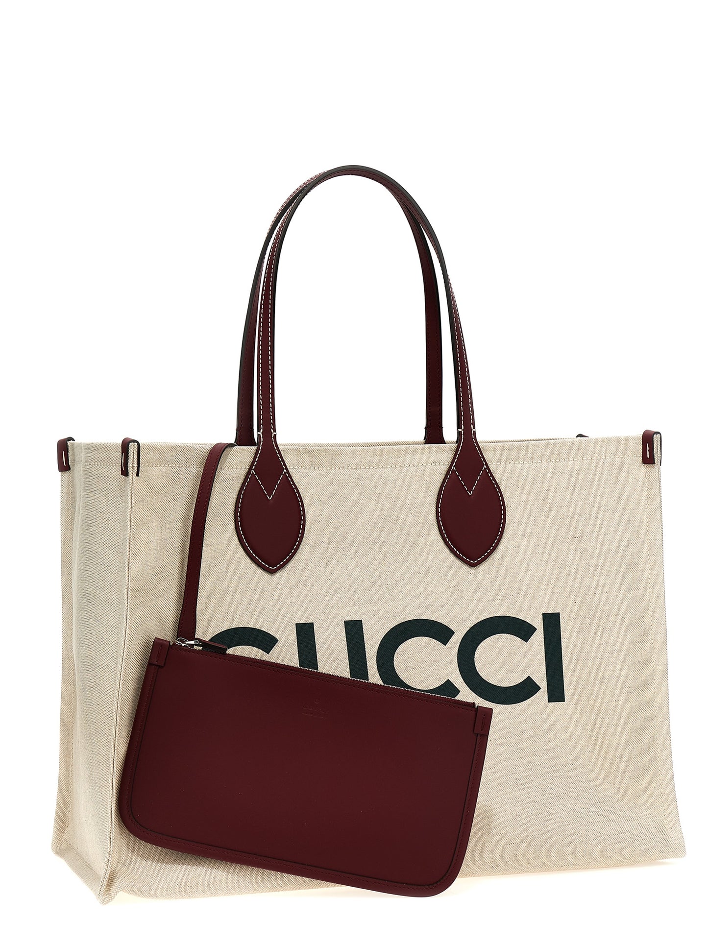 This Shopper Tote Clutch Bag by Gucci for women in cotton polyester canvas beige & print features an jet-set Cotton Polyester Canvas Shopper Tote Clutch Bag design with a secure , ample , and jet-set handle.
