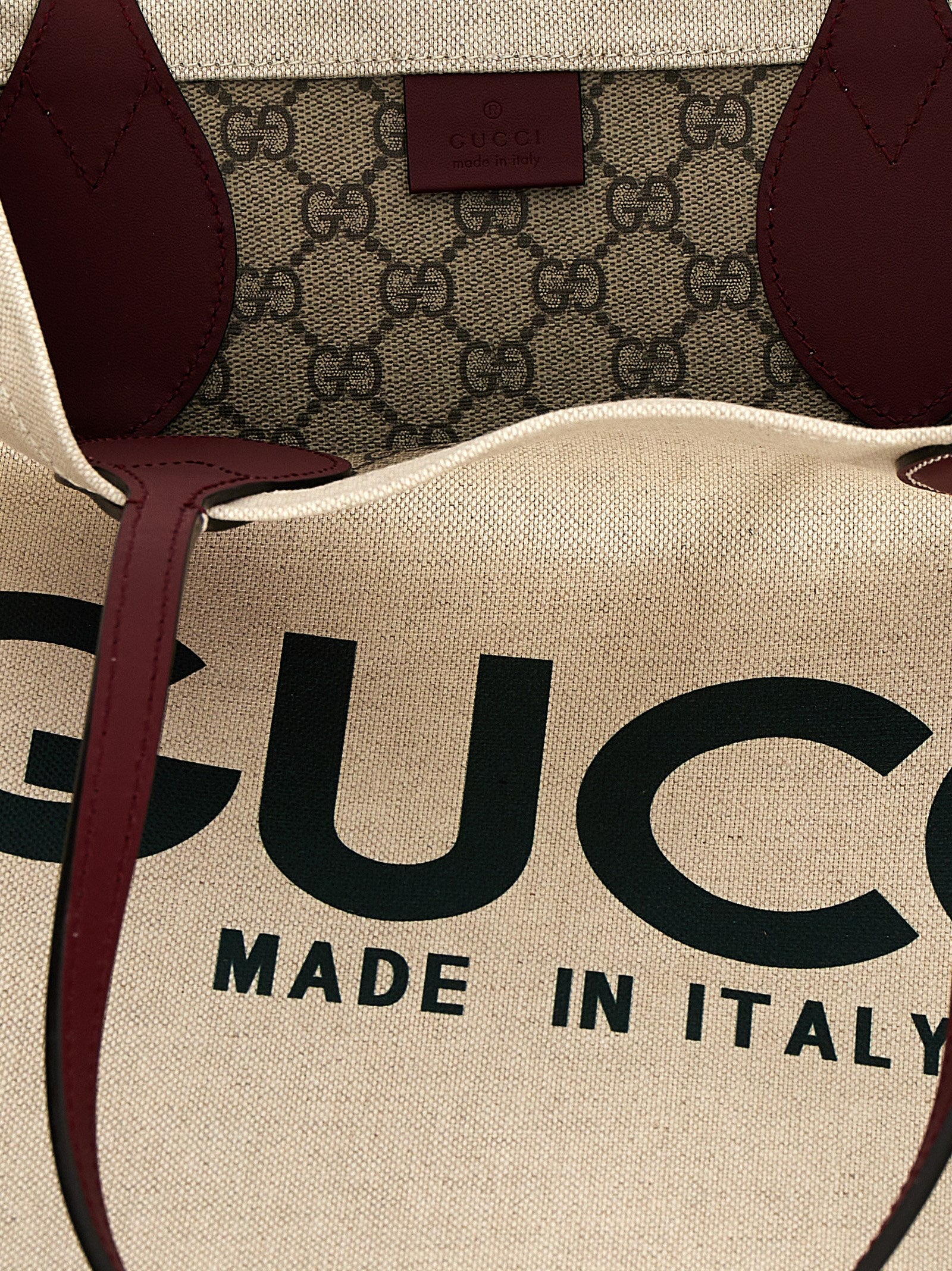 Shopper Tote Clutch Bag by Gucci for women in cotton polyester canvas beige & print features an jet-set Cotton Polyester Canvas Shopper Tote Clutch Bag design with a secure , ample , and versatile handle for an jet-set finish.