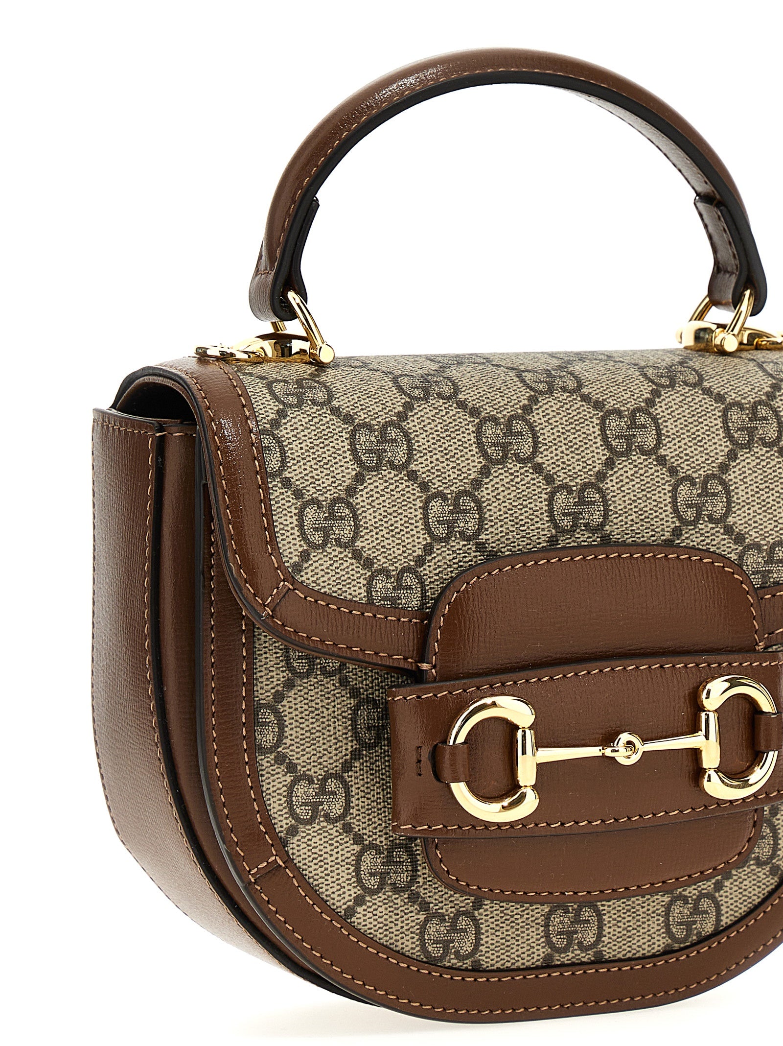 Flap Handbag by Gucci for women in poly cotton & leather brown & signature features a refined silhouette, showcasing a secure flap & magnetic, organized , and versatile shoulder-strap & handle for a refined finish.