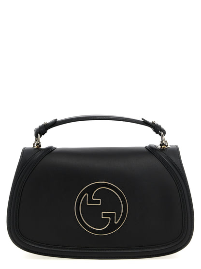 Medium Flap Handbag by Gucci for women in calfskin leather black presents a ornamental silhouette, showcasing a secure flap & magnetic, ample , and versatile shoulder-strap, handle & adjustable-strap for a ornamental finish.