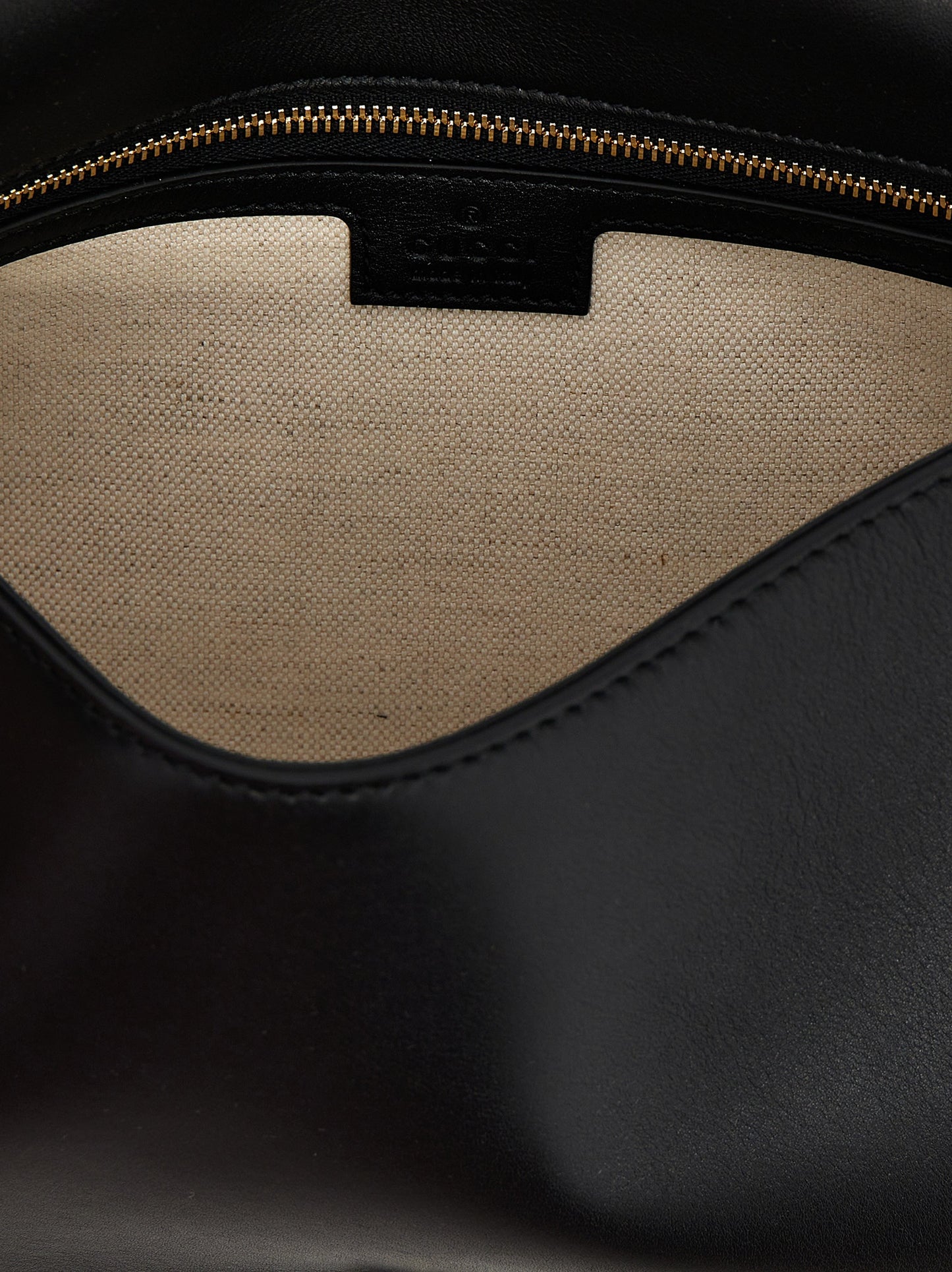 Medium Flap Handbag by Gucci for women in calfskin leather black features an refined silhouette, showcasing a secure flap & magnetic, ample , and versatile shoulder-strap, handle & adjustable-strap for a sophisticated refined aesthetic.