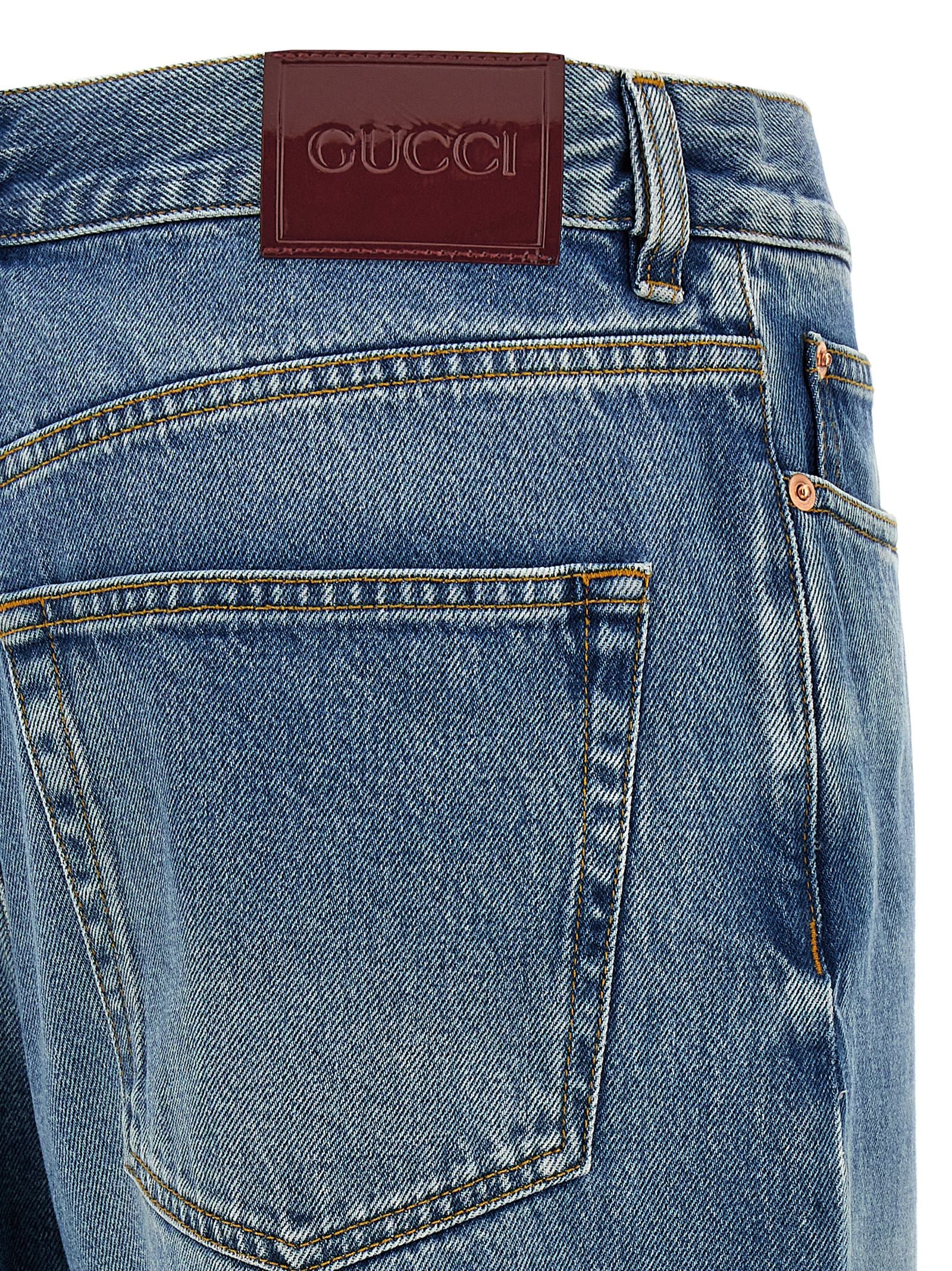 Jeans by Gucci for women in denim cotton blue & signature features a polished silhouette with a polished relaxed-fit, boyfriend & oversized, reaching a polished long and finished with a polished mid rise.