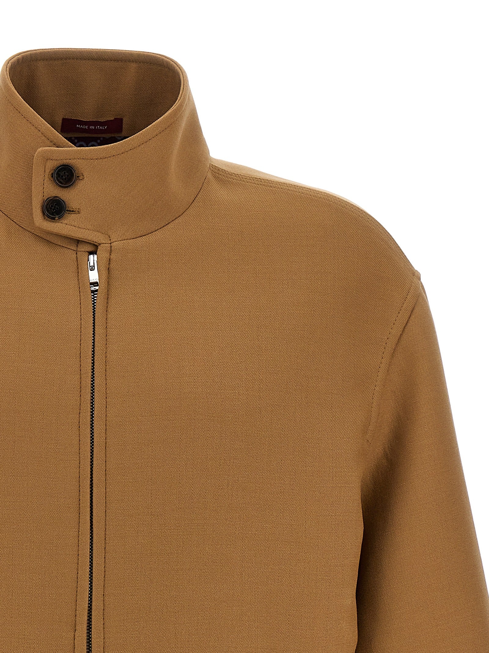 Overcoat by Gucci for men in wool & silk brown & monogram presents a luxurious silhouette, showcasing a luxurious high-neck neckline and sophisticated pockets for a premium, luxurious look.