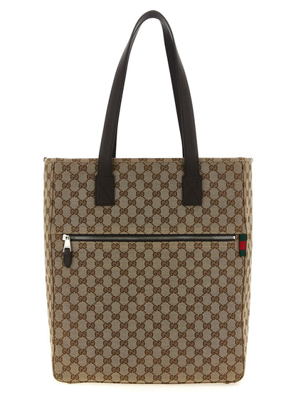 Shoulder Bag by Gucci for men in poly cotton & leather brown, signature & monogram features a distinguished silhouette, showcasing a secure zipper and distinguished with versatile shoulder-strap & handle for a distinguished finish.