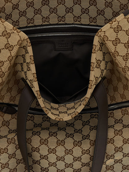 Shoulder Bag by Gucci for men in poly cotton & leather brown, signature & monogram features a effortless chic silhouette with a secure zipper, ample , and versatile shoulder-strap & handle for a effortless chic finish.