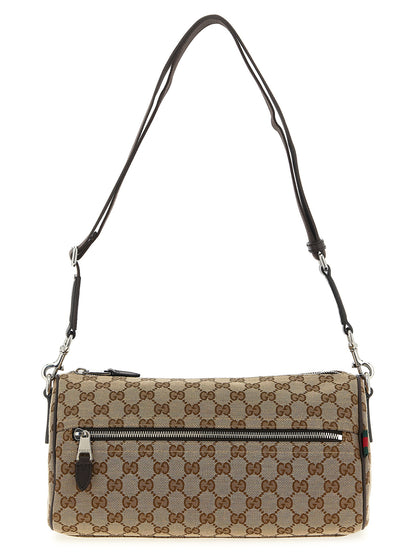 Small Crossbody Messenger Bag by Gucci for men in poly cotton & leather beige features a statement-making Gg Poly Cotton & Leather Small Crossbody Messenger Bag design with a secure zipper, statement-making , and versatile crossbody-strap, shoulder-strap & adjustable-strap for a sophisticated look.