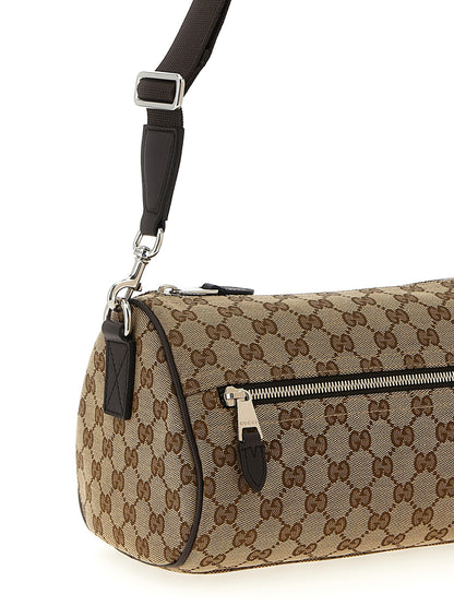 This Small Crossbody Messenger Bag by Gucci for men in poly cotton & leather beige presents a versatile silhouette from the Gg Poly Cotton & Leather Small Crossbody Messenger Bag collection, featuring a secure zipper, ample , and versatile crossbody-strap, shoulder-strap & adjustable-strap.
