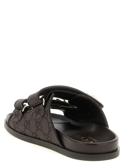 Sliders Flat Shoes by Gucci for women in rubber polyester leather & cotton brown showcases a resplendent Gg Women's Rubber Polyester Leather & Cotton Sliders Flat Shoes aesthetic with a and .