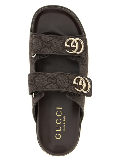 Sliders Flat Shoes by Gucci for women in rubber polyester leather & cotton brown presents a effortless chic silhouette, showcasing the Gg Women's Rubber Polyester Leather & Cotton Sliders Flat Shoes design with a effortless chic and for a sophisticated look.