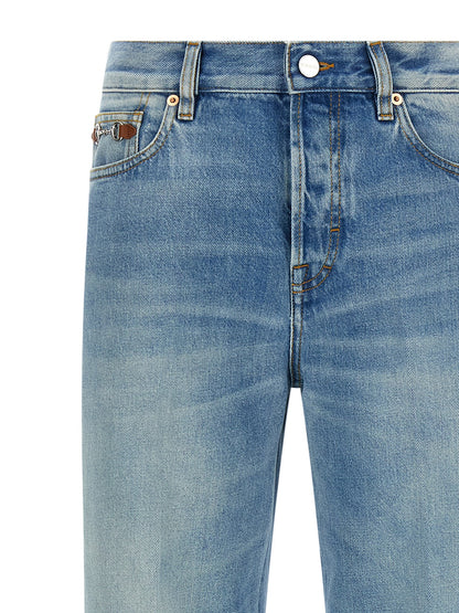 Jeans by Gucci for women in denim cotton light-blue presents a tailored silhouette, showcasing a tailored flared and long cut with a refined for a truly tailored aesthetic.