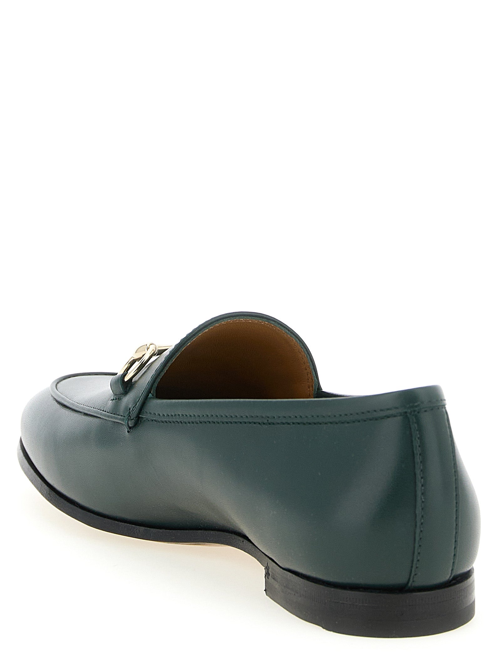 This Flat Loafer Slip-On Shoes by Gucci for women in calfskin leather bicolour & green features an exquisite silhouette from the Women's Calfskin Leather Flat Loafer Slip-On Shoes collection, defined by a sophisticated flat and elegant almond toe style.