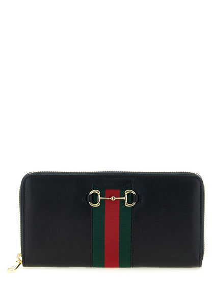 Cardholder Card Case by Gucci for women in calfskin leather black & signature features an dynamic silhouette from the Horsebit Calfskin Leather Cardholder Card Case collection, highlighting dynamic card-organization zip-around for a premium and sophisticated look.