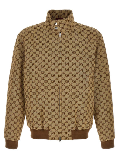 Bomber Jacket by Gucci for men in cotton polyester beige & signature features a city-ready silhouette, detailed with pockets and a city-ready high-neck neckline.