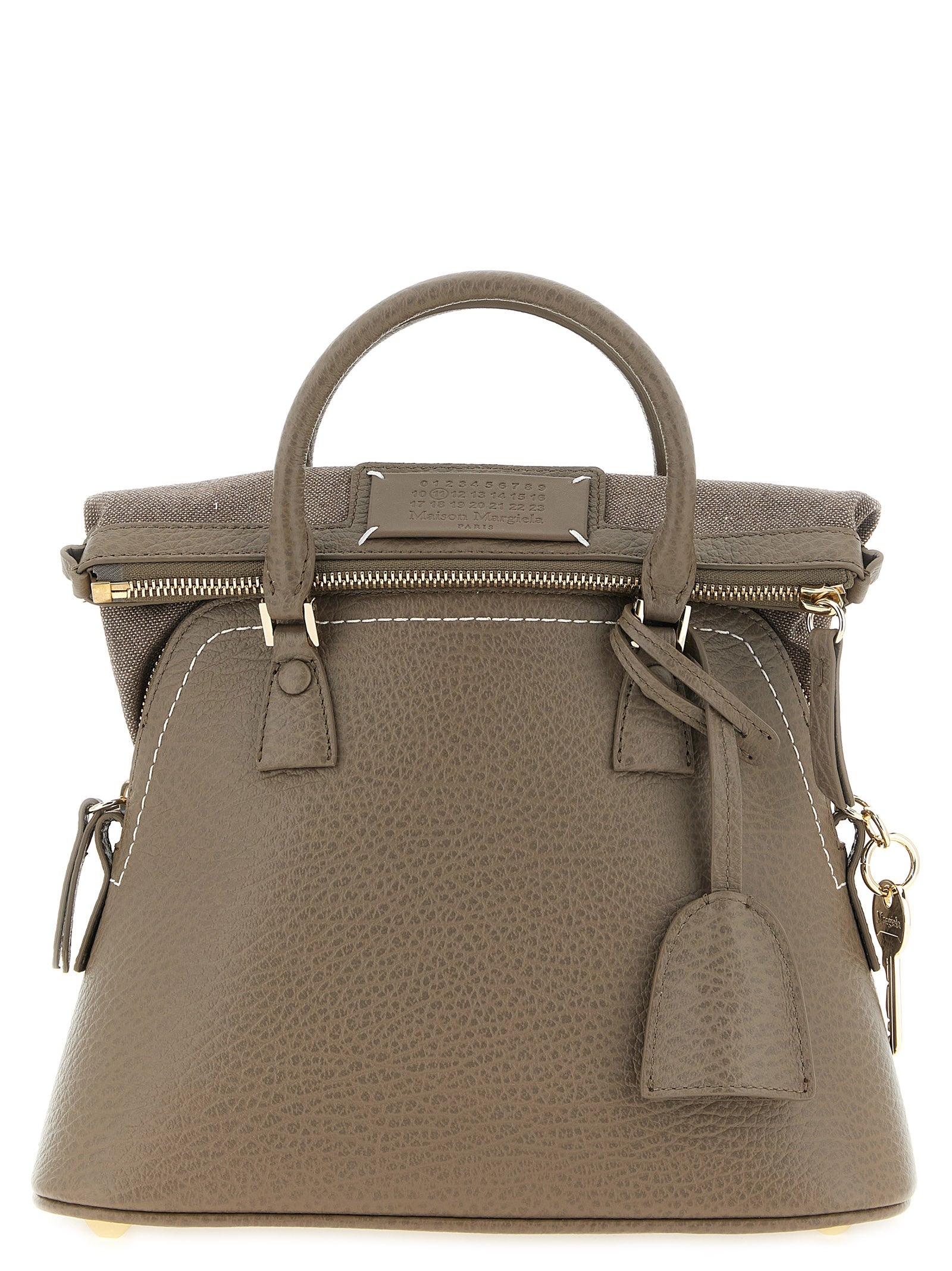 Mini Shoulder Bag by Maison Margiela for women in canvas caiman & calf leather gray, gold, white & signature features a enviable silhouette, showcasing a secure , ample , and enviable shoulder-strap, handle & adjustable-strap for a enviable finish.