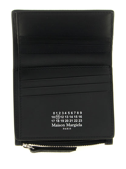 Cardholder Card Case by Maison Margiela for women in calfskin leather black, silver & signature features a sleek silhouette, showcasing the sleek design of the Four Stitches Calfskin Leather Cardholder Card Case with functional card-organization for a premium look.