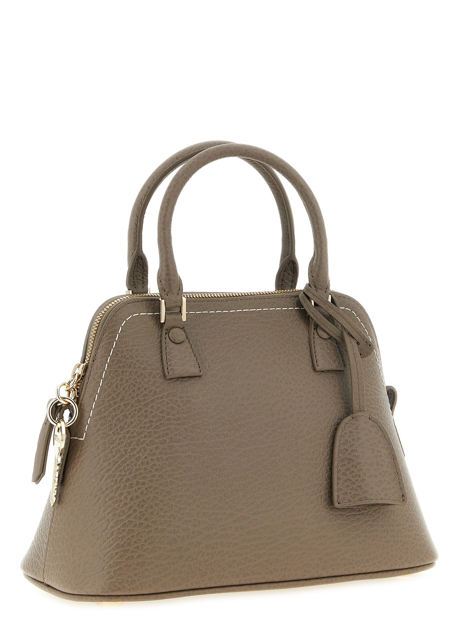 Mini Shoulder Bag by Maison Margiela for women in canvas caiman & calf leather gray, gold, white & signature features a effortless chic silhouette with a secure , ample , and versatile shoulder-strap, handle & adjustable-strap for a effortless chic finish.