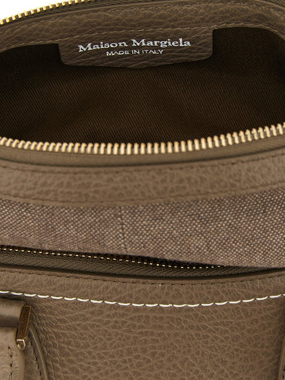 Mini Shoulder Bag by Maison Margiela for women in canvas caiman & calf leather gray, gold, white & signature features a effortless sophistication silhouette, secured by a with ample and versatile shoulder-strap, handle & adjustable-strap for a effortless sophistication finish.