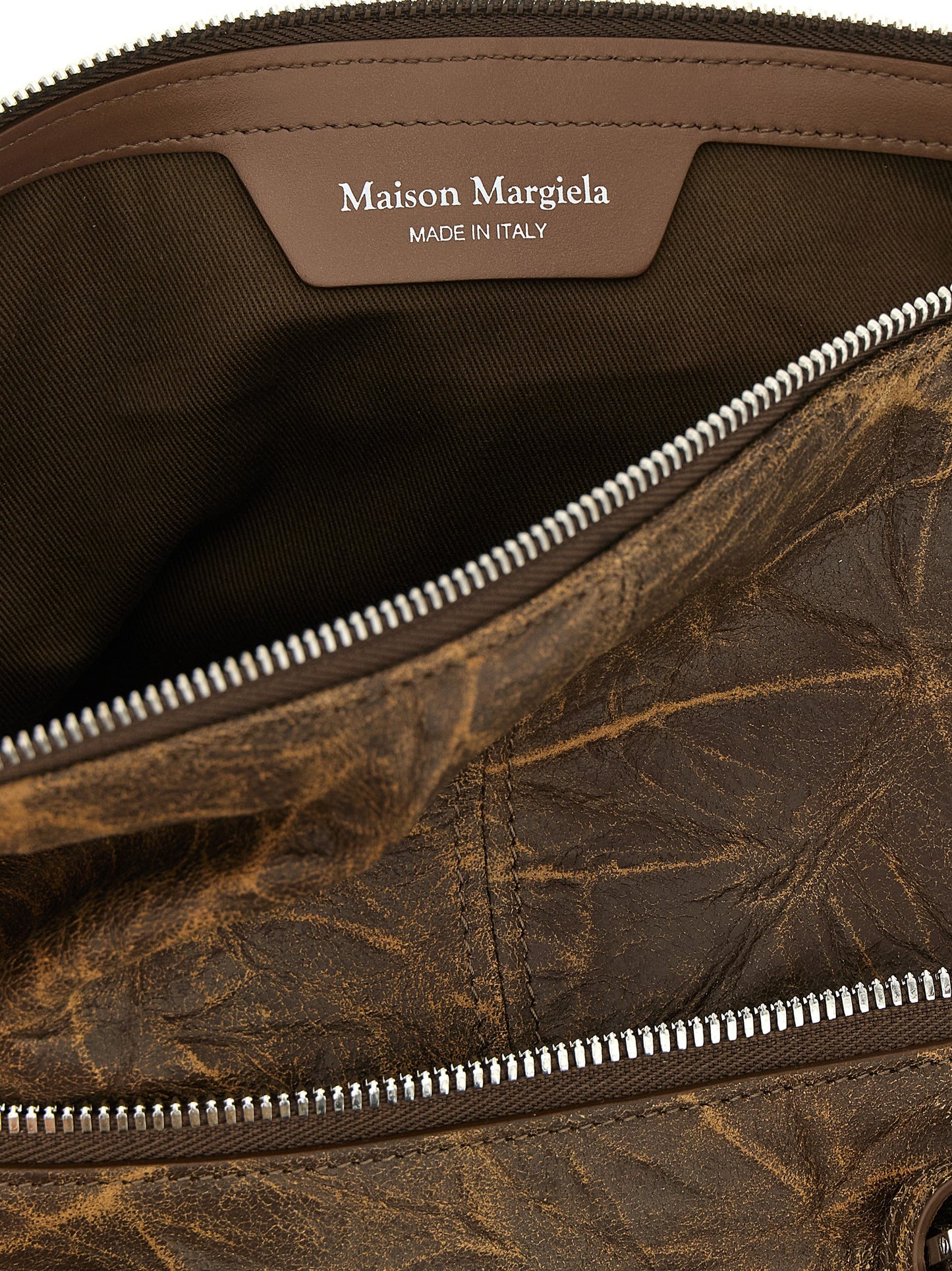 Shoulder Bag by Maison Margiela for women in viscose goat leather & fur brown & silver features a effortless sophistication silhouette, secured by a with ample and versatile shoulder-strap & adjustable-strap for a effortless sophistication finish.