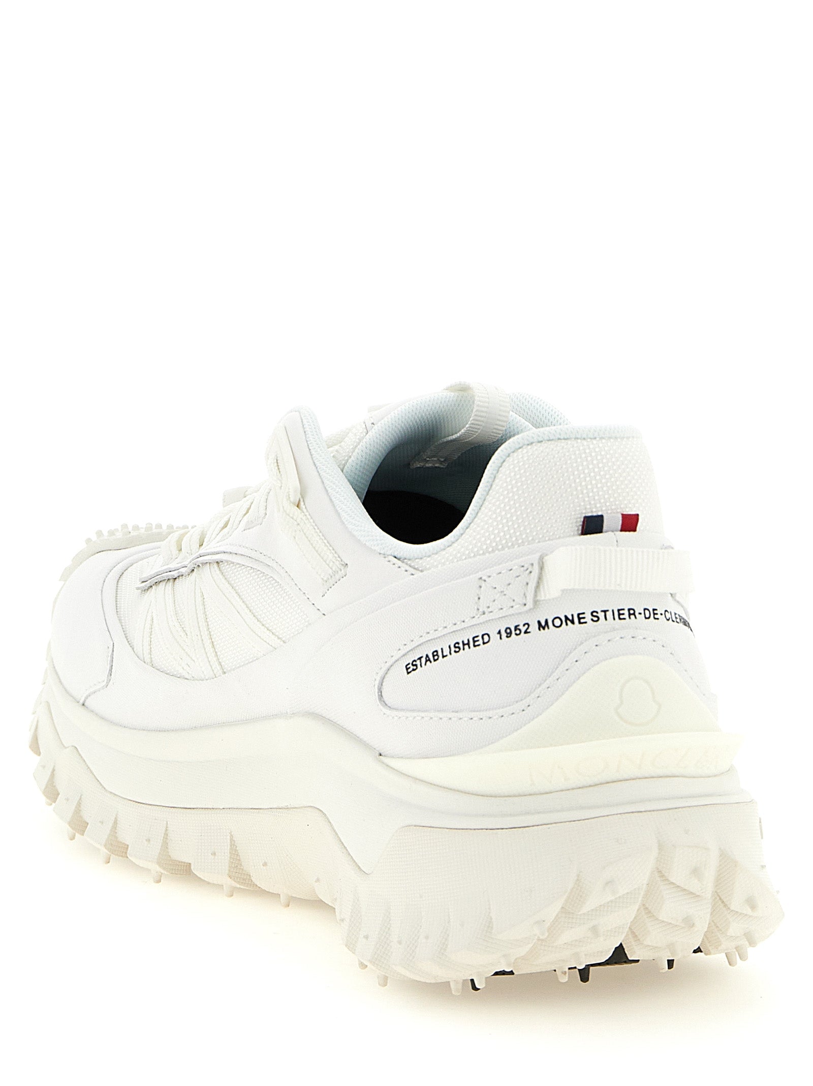 Athletic Sneakers by Moncler for men in leather white & signature showcases a architectural silhouette, artfully capturing the essence of the Men's Athletic Leather Sneakers with its signature architectural athletic style construction.