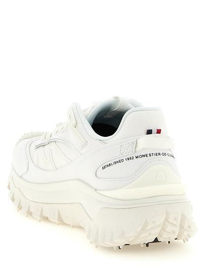 Athletic Sneakers by Moncler for men in leather white & signature showcases a architectural silhouette, artfully capturing the essence of the Men's Athletic Leather Sneakers with its signature architectural athletic style construction.