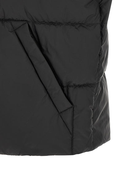 Vest by Moncler for men in polyamide felt black showcases a dynamic silhouette, perfectly balancing pockets with a dynamic for a sophisticated, high-fashion look.