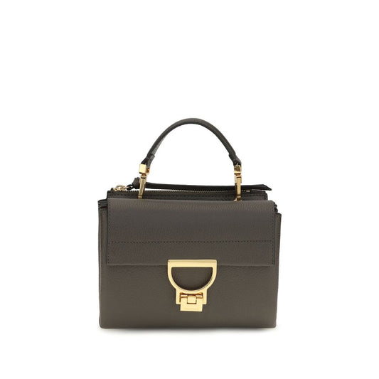 Flap Handbag by Coccinelle for women in bos taurus calfskin leather brown, gold, signature & monogram features a exquisite silhouette, showcasing a secure flap & zipper and exquisite with versatile shoulder-strap, handle & adjustable-strap for a exquisite finish.