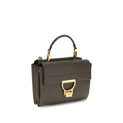 Flap Handbag by Coccinelle for women in bos taurus calfskin leather brown, gold, signature & monogram features a signature silhouette, showcasing a secure flap & zipper and signature with versatile shoulder-strap, handle & adjustable-strap for a sophisticated look.
