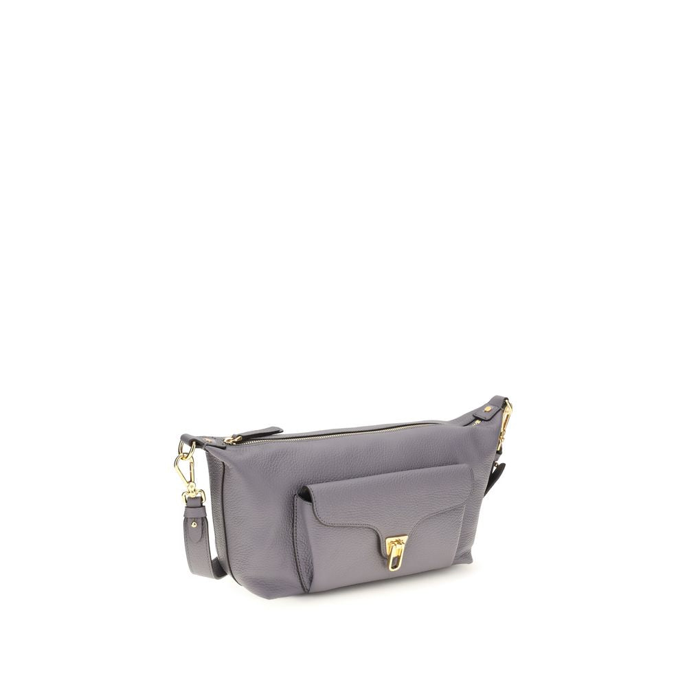 Shoulder Bag by Coccinelle for women in bos taurus calf leather gray, gold & signature features a enviable silhouette, showcasing a secure zipper, ample external-pockets, and enviable shoulder-strap & adjustable-strap for a enviable finish.