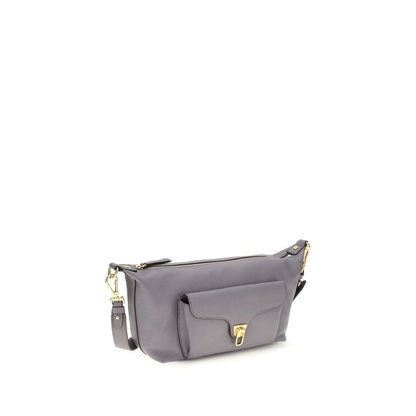 Shoulder Bag by Coccinelle for women in bos taurus calf leather gray, gold & signature features a enviable silhouette, showcasing a secure zipper, ample external-pockets, and enviable shoulder-strap & adjustable-strap for a enviable finish.