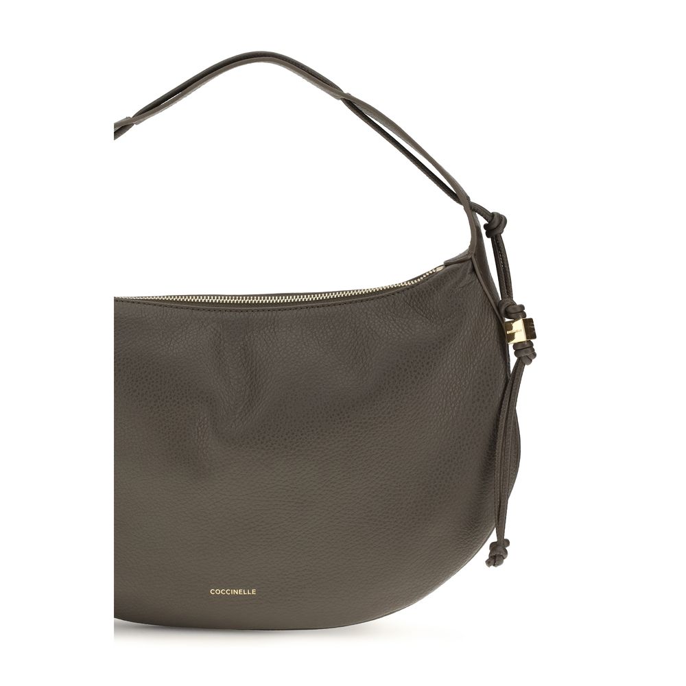 Shoulder Bag by Coccinelle for women in bos taurus grained calf leather brown, gold & signature features an effortlessly chic silhouette with a secure zipper, ample , and versatile shoulder-strap for effortlessly chic everyday luxury.