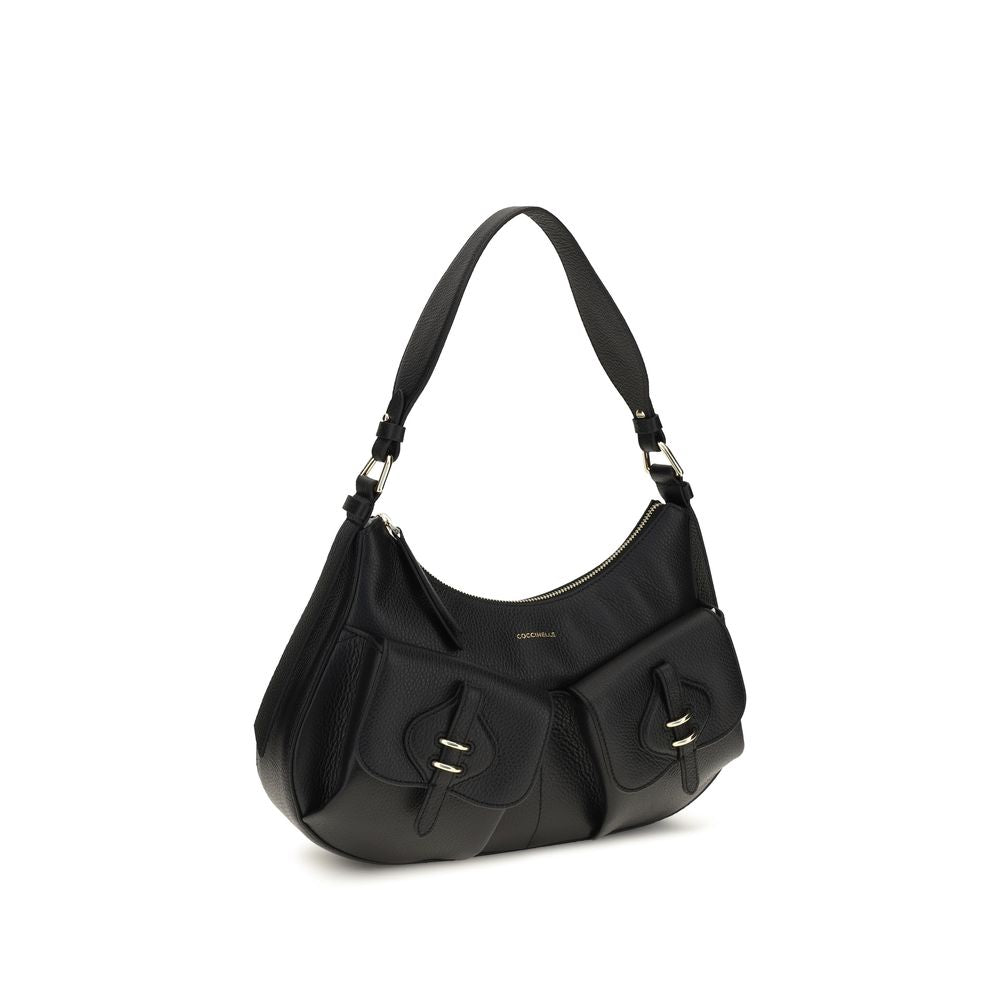 Small Shoulder Bag by Coccinelle for women in bos taurus calf leather black, gold & signature features an effortlessly chic silhouette with a secure zipper & magnetic, ample built-in-compartments, and versatile shoulder-strap, adjustable-strap & handle for effortlessly chic everyday luxury.