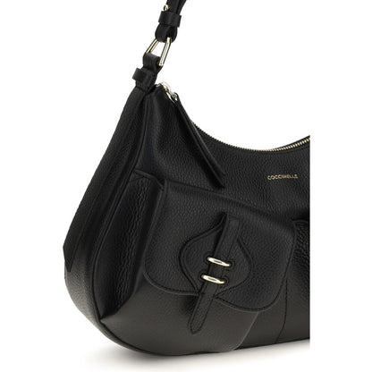 Small Shoulder Bag by Coccinelle for women in bos taurus calf leather black, gold & signature showcases a enviable silhouette, artfully detailed with a secure zipper & magnetic, organized built-in-compartments, and versatile shoulder-strap, adjustable-strap & handle for a enviable look.