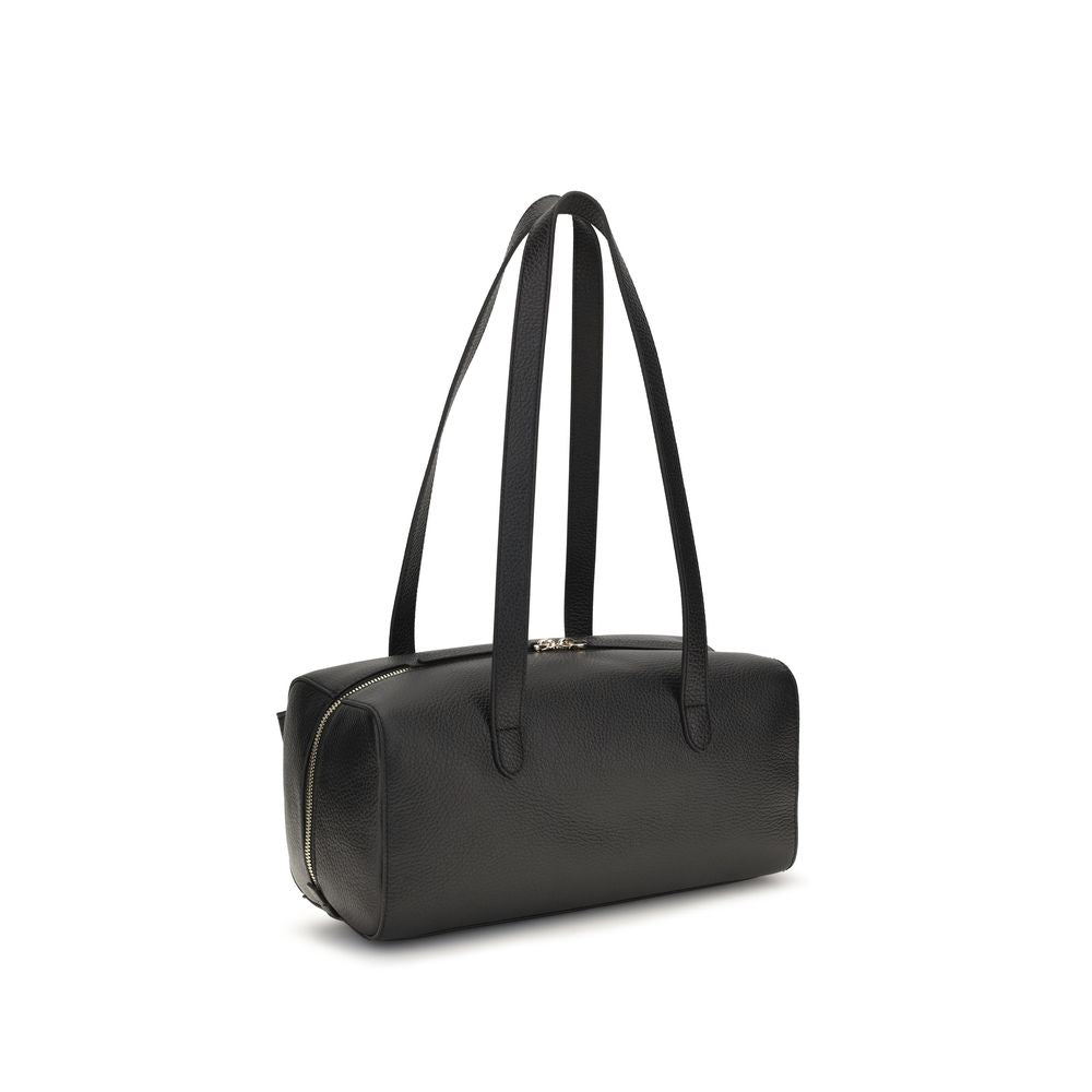 Shoulder Flap Bag by Coccinelle for women in bos taurus calf leather black features a distinguished silhouette, showcasing a secure flap & zipper and distinguished with versatile shoulder-strap & handle for a distinguished finish.