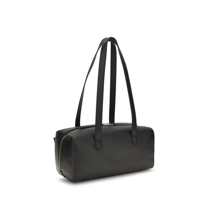 Shoulder Flap Bag by Coccinelle for women in bos taurus calf leather black features a distinguished silhouette, showcasing a secure flap & zipper and distinguished with versatile shoulder-strap & handle for a distinguished finish.