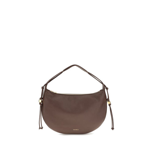 Shoulder Bag by Coccinelle for women in bos taurus grained calf leather brown, gold & signature features an effortlessly chic silhouette with a secure zipper, ample , and versatile shoulder-strap for effortlessly chic everyday luxury.