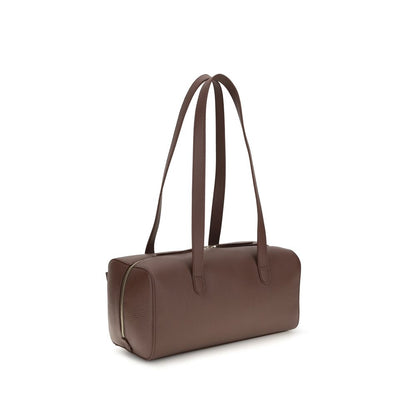 Shoulder Flap Bag by Coccinelle for women in bos taurus calf leather brown showcases a enviable silhouette, artfully detailed with a secure flap & zipper, organized external-pockets, and versatile shoulder-strap & handle for a enviable look.