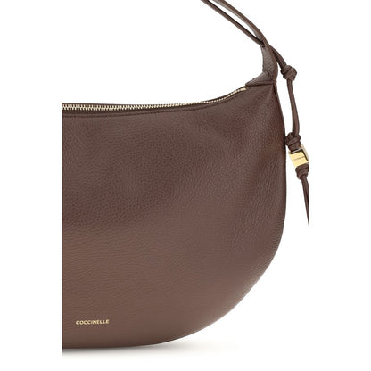 Shoulder Bag by Coccinelle for women in bos taurus grained calf leather brown, gold & signature features a effortless sophistication silhouette, secured by a zipper with ample and versatile shoulder-strap for a effortless sophistication finish.