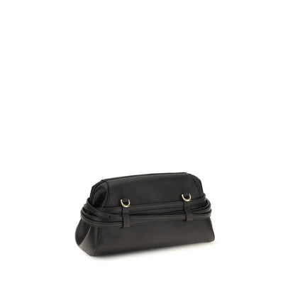 Evening Clutch Handbag by Moschino for women in goatskin leather black & gold features a sculptural silhouette with a secure magnetic, organized , and versatile belt-strap for a sculptural finish.