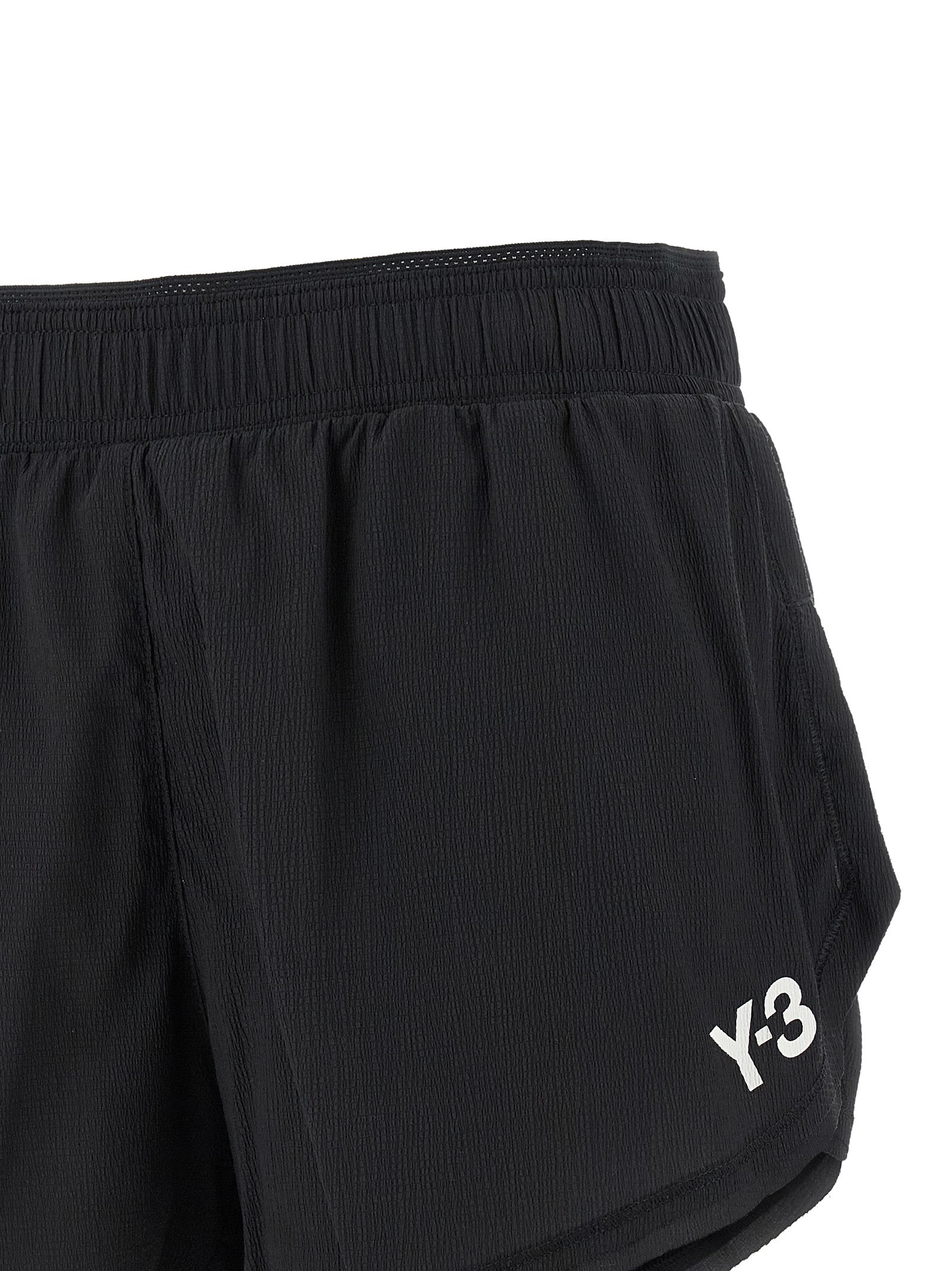Bermuda Shorts by Y-3 for women in stretch polyamide black & print features an tailored silhouette, showcasing a tailored athletic & wide with a short and for a sophisticated look.