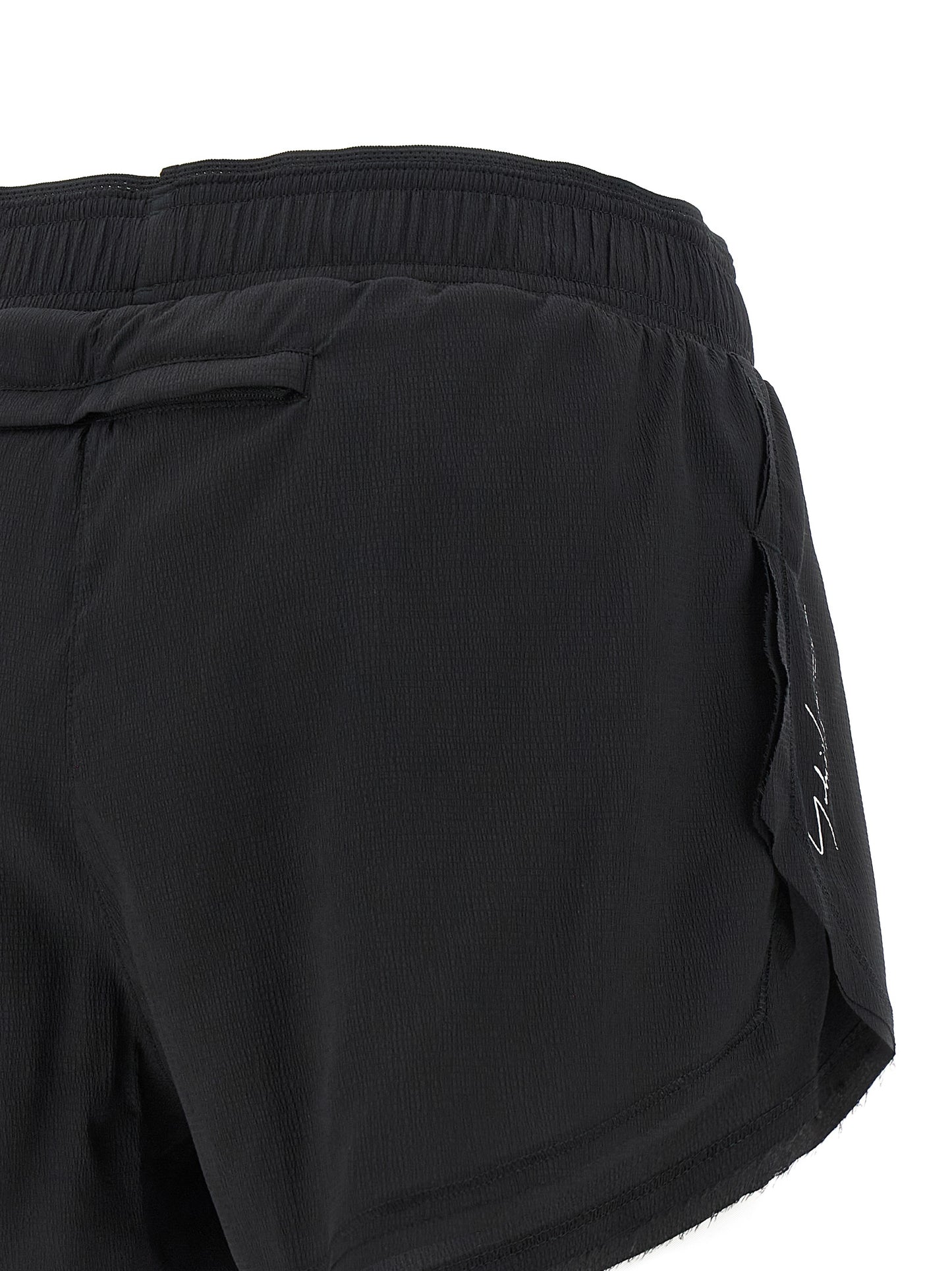Bermuda Shorts by Y-3 for women in stretch polyamide black & print features a sartorial silhouette, showcasing a sartorial athletic & wide and short with a sophisticated for a sartorial look.