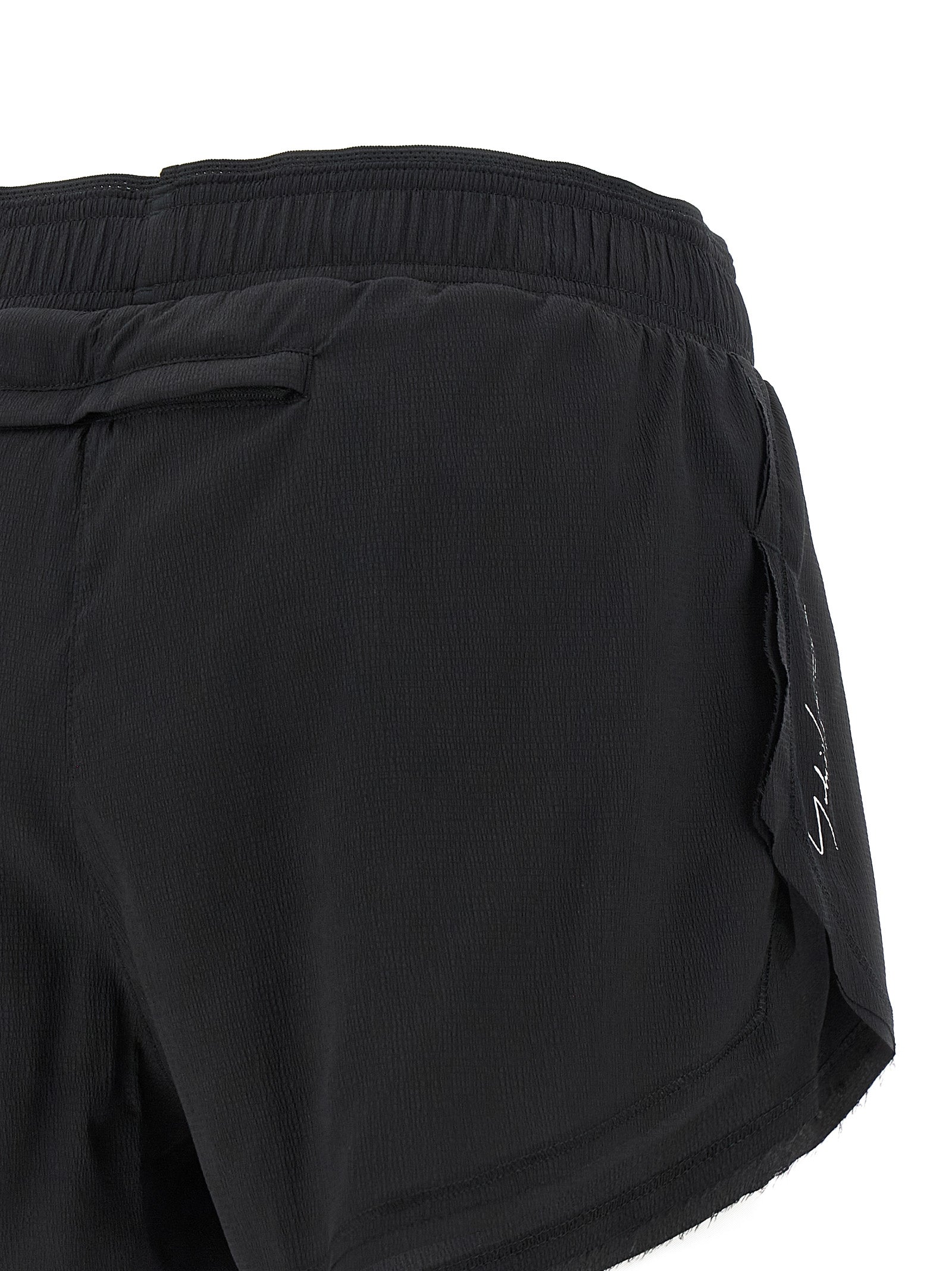Bermuda Shorts by Y-3 for women in stretch polyamide black & print features a sartorial silhouette, showcasing a sartorial athletic & wide and short with a sophisticated for a sartorial look.