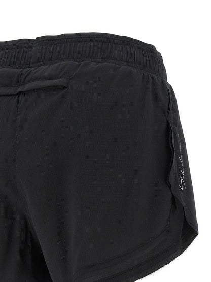 Bermuda Shorts by Y-3 for women in stretch polyamide black & print features a sartorial silhouette, showcasing a sartorial athletic & wide and short with a sophisticated for a sartorial look.